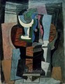 Compotier and bottle on a table 1920 Pablo Picasso